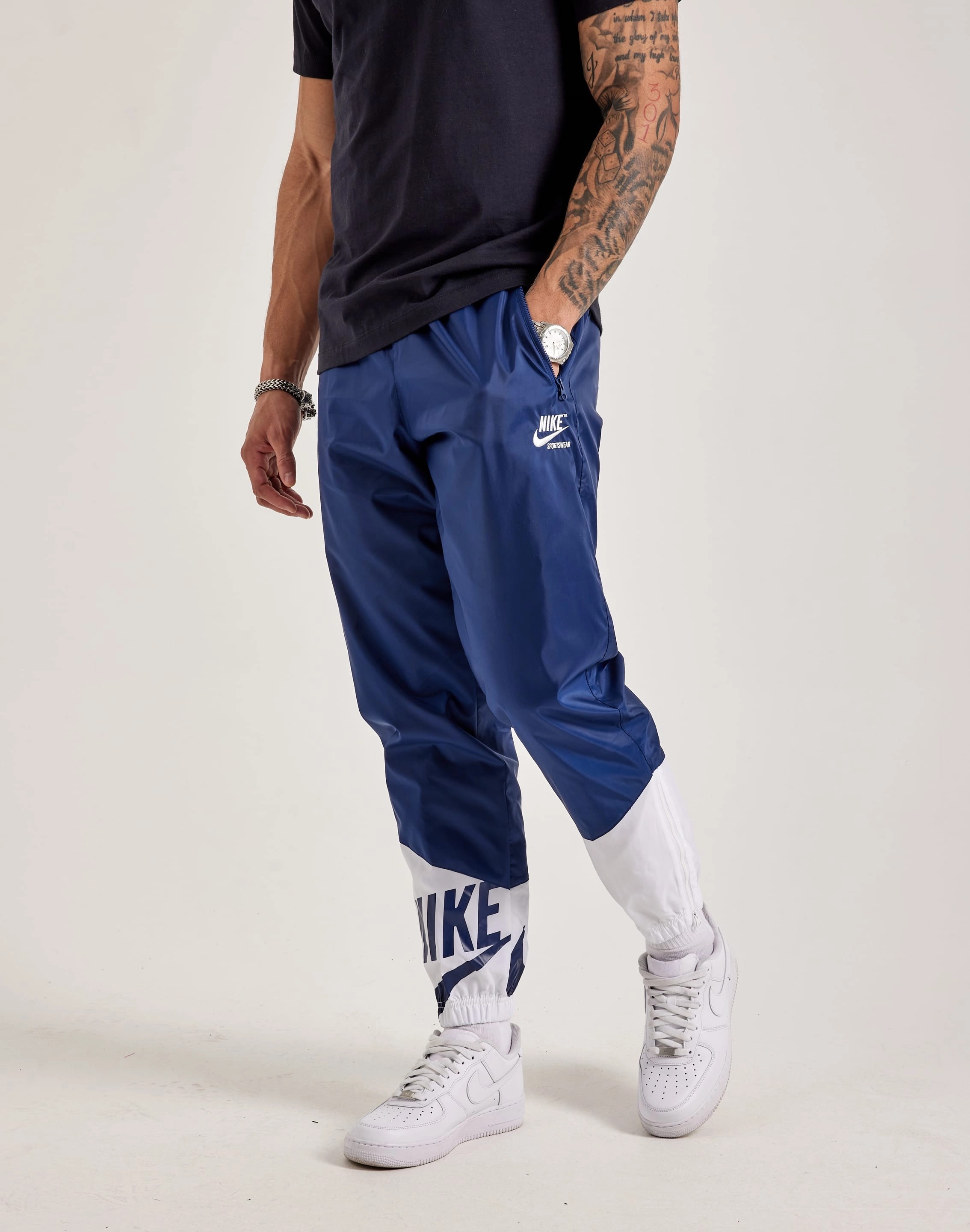 Designer fashion items Nike Sportswear Woven Graphic Pants Fashion museums