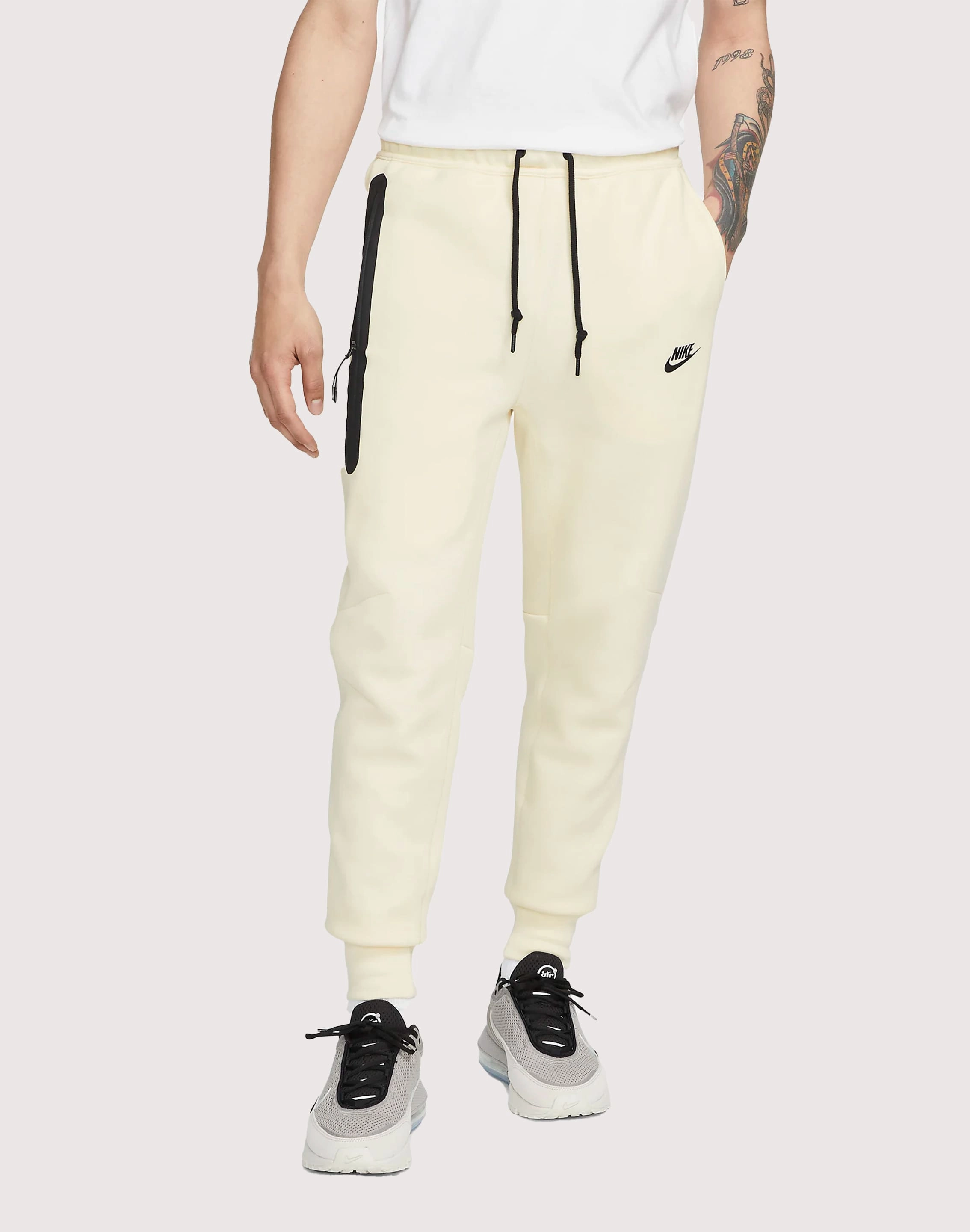 Nike Tech Fleece Slim-Fit Joggers Recycled fashion materials Formal wear selections