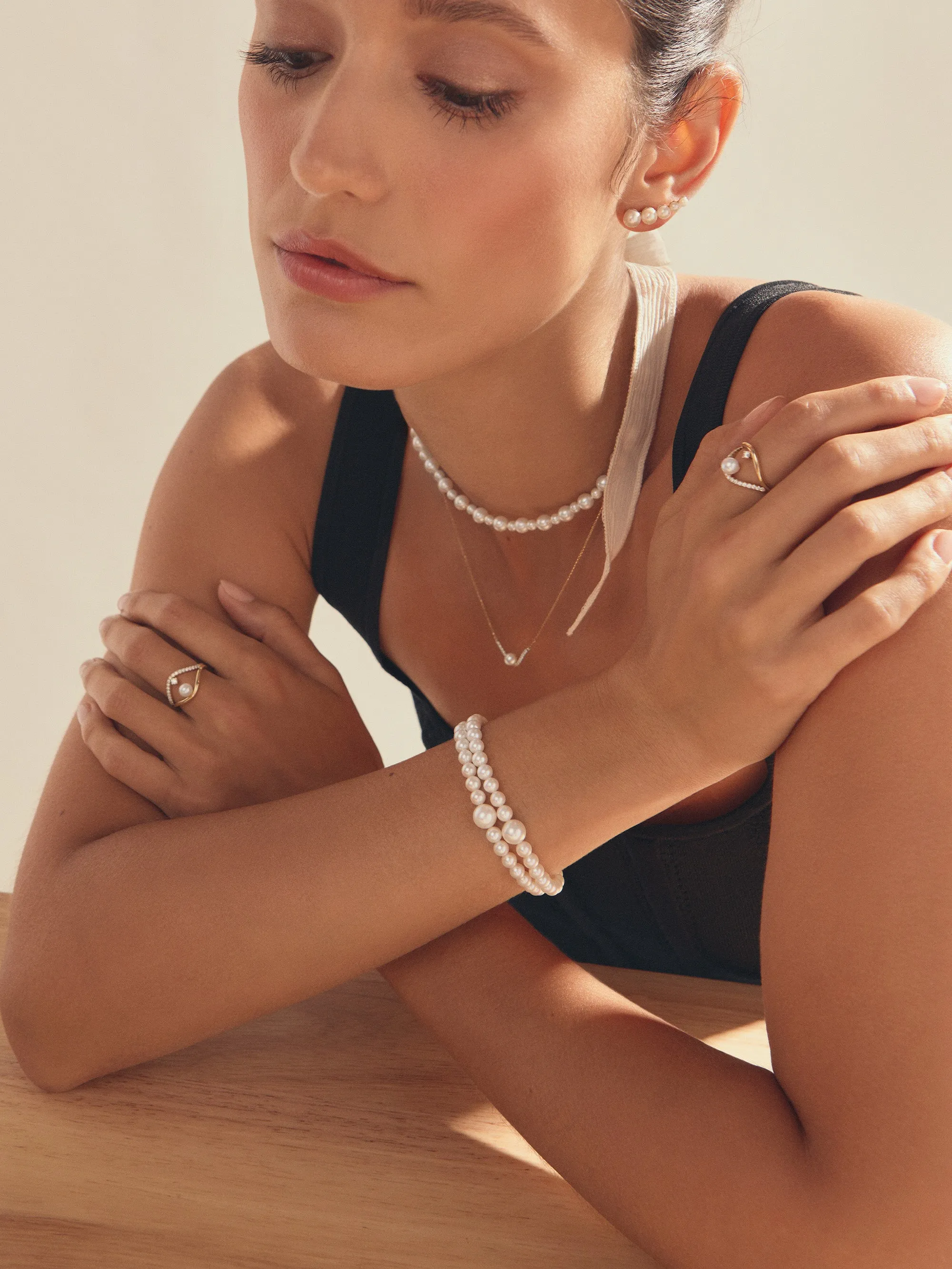 SBR109 Sea of Beauty. Gold and Pearl Curve Ring