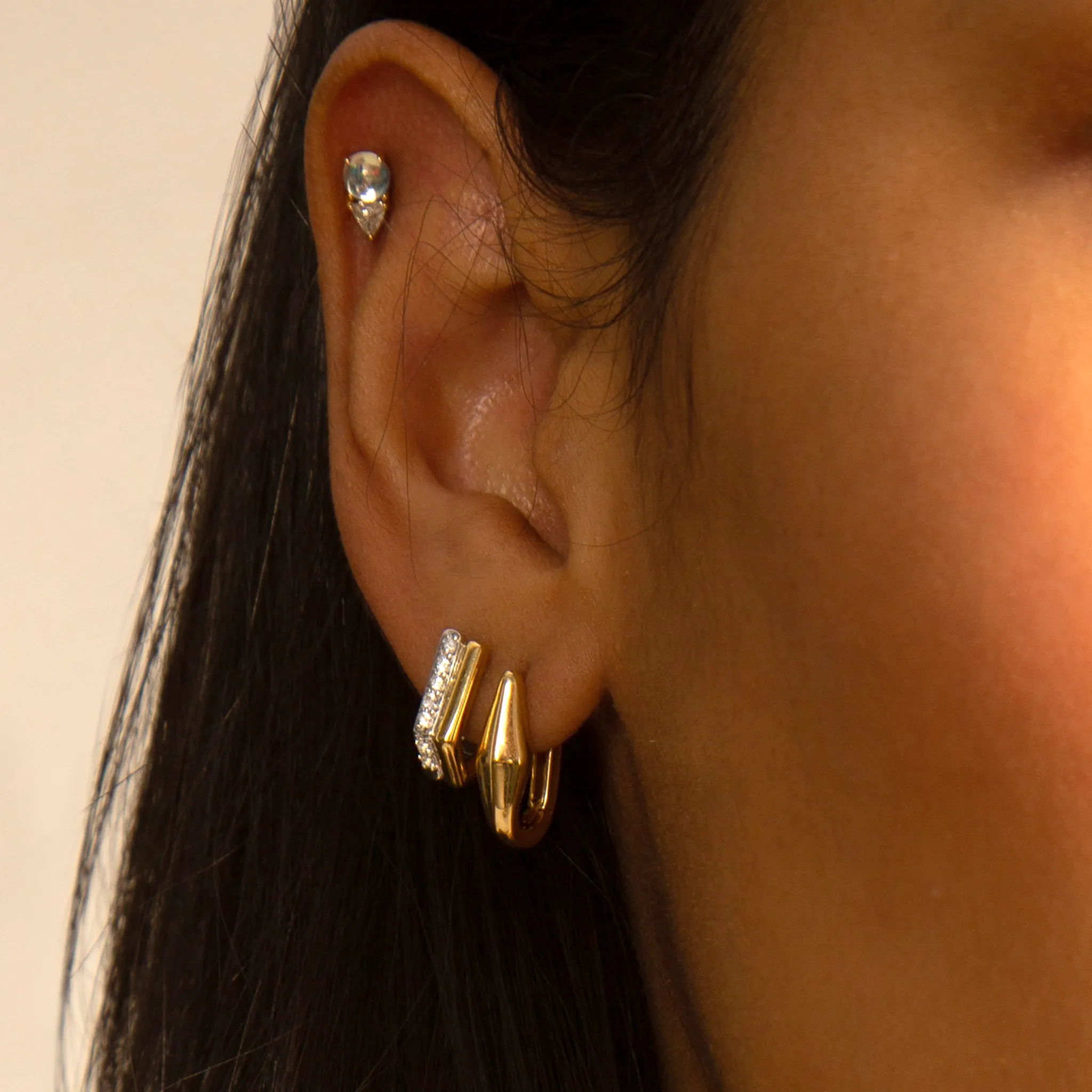 Two-Tone Infinity Huggie Earrings with Sapphires
